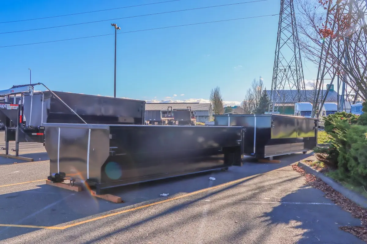 Roll-off dumpster ready for waste disposal at job site for 8 Yard Dumpster Rental in Barling